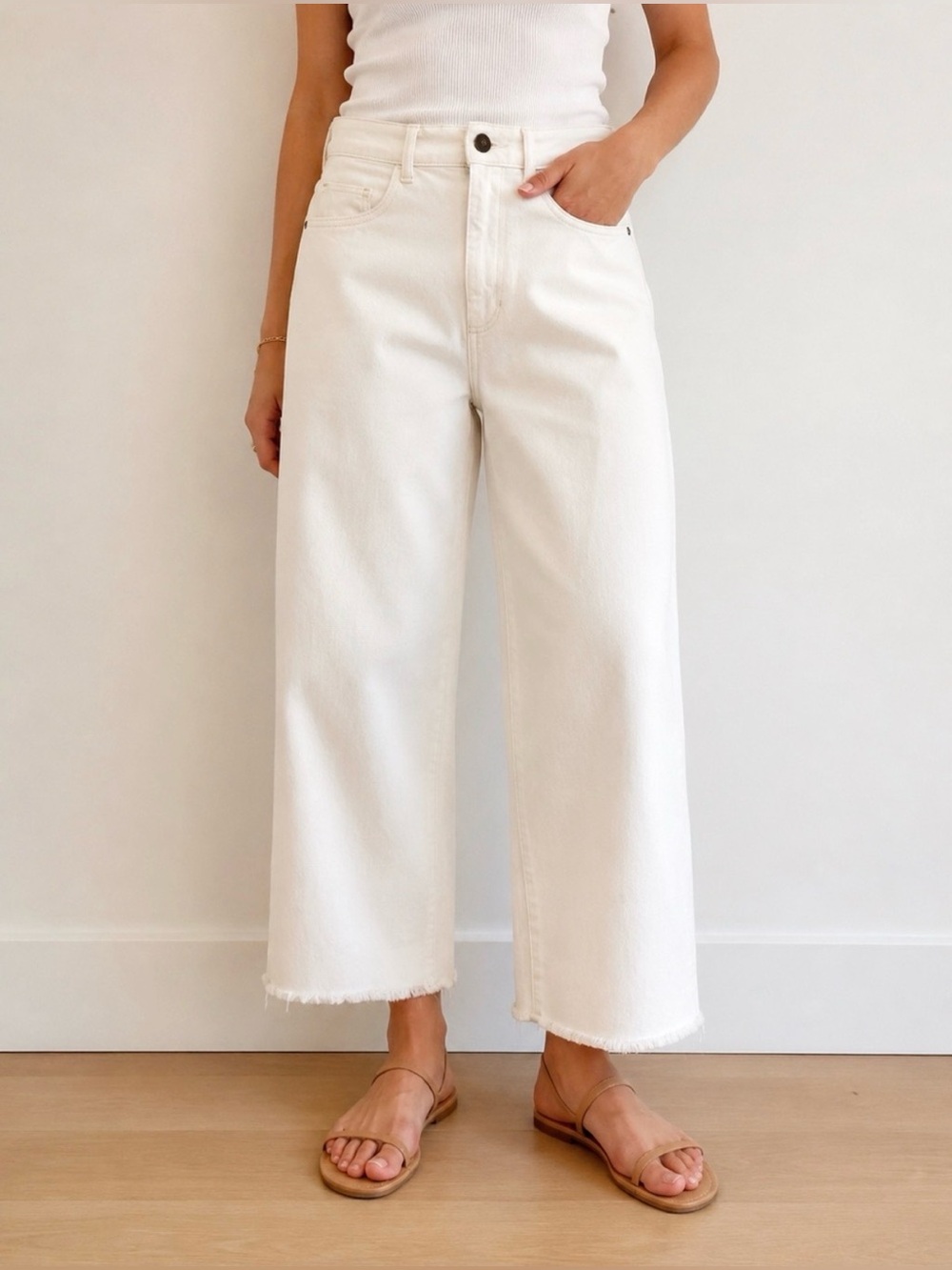 DL1961 Hepburn high rise wide leg Off-White Denim Jeans with raw hem